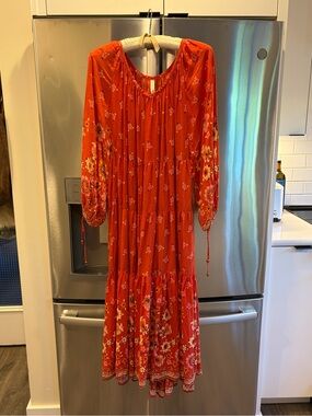 Spell and the Gypsy red maxi dress.